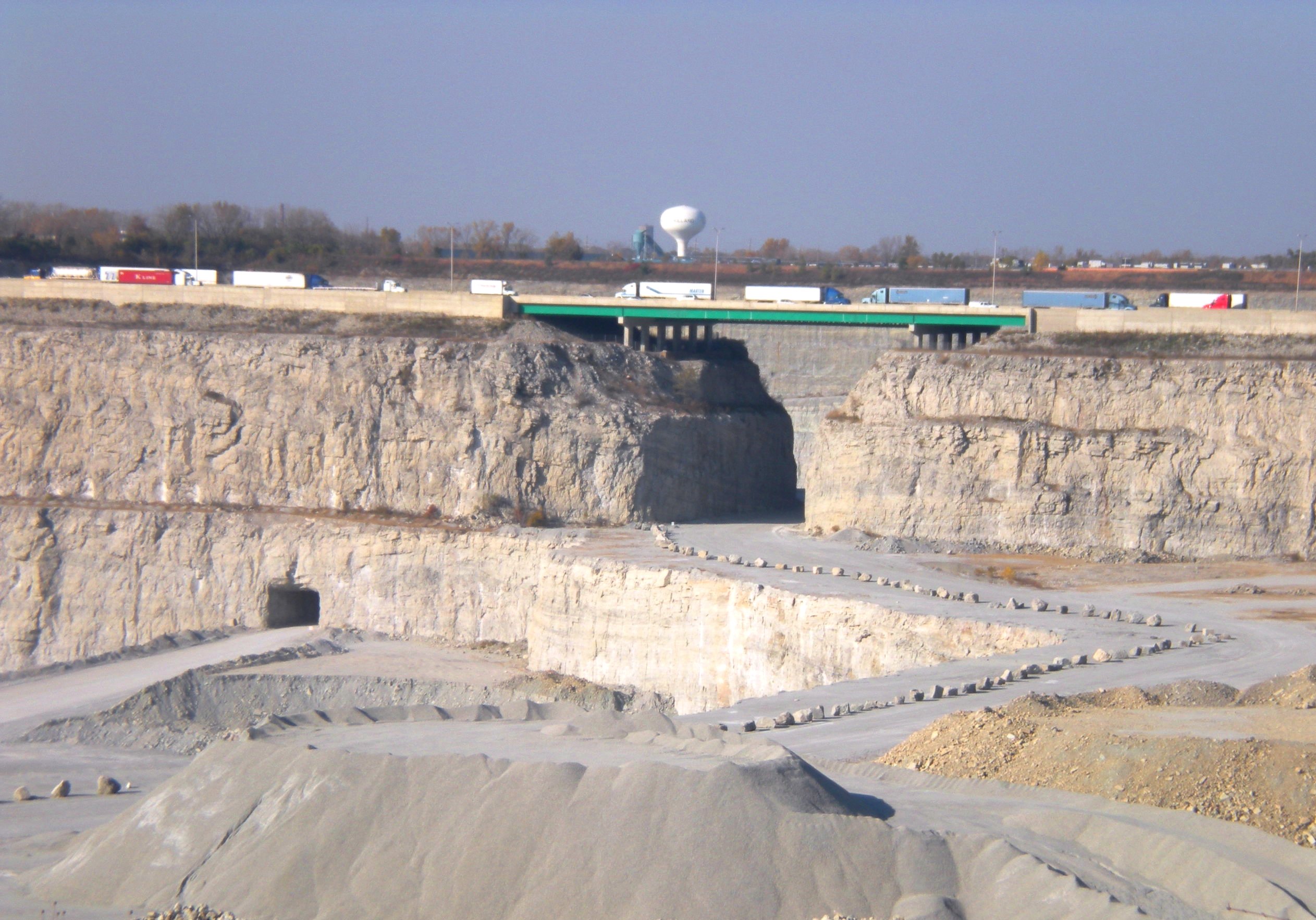 photo of a quarry with an arched opening 