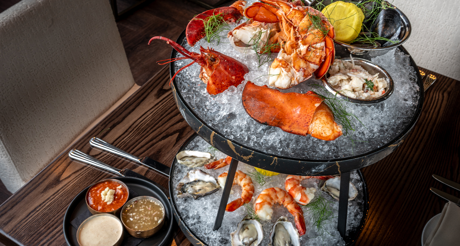 seafood tower with crab, lobster, oysters and other seafood - 