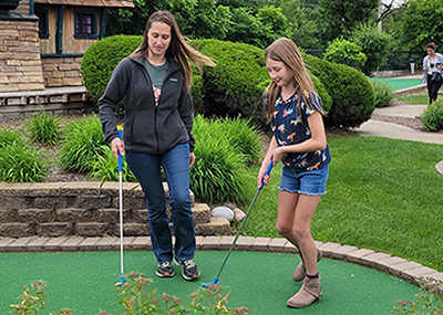 MOMS PLAY GOLF FREE AT HAUNTED TRAILS JOLIET